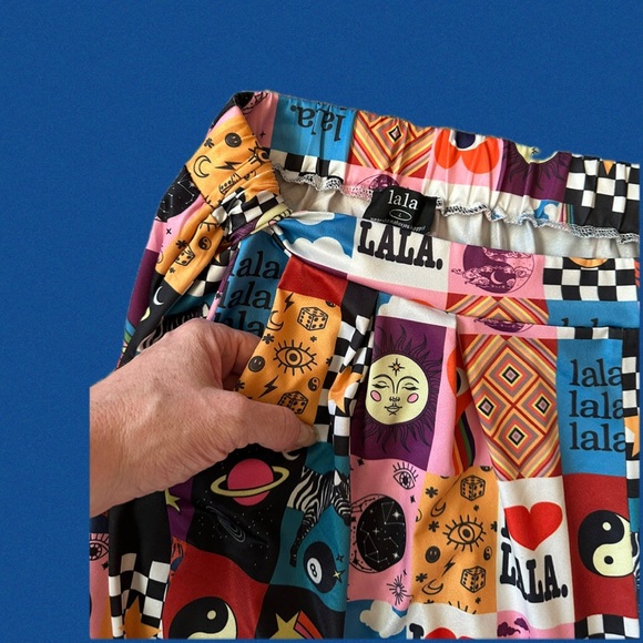 The Original Discontinued Dressed in LaLa 
Signature Print Pleated Wide Leg Pant - Picture 6 of 12